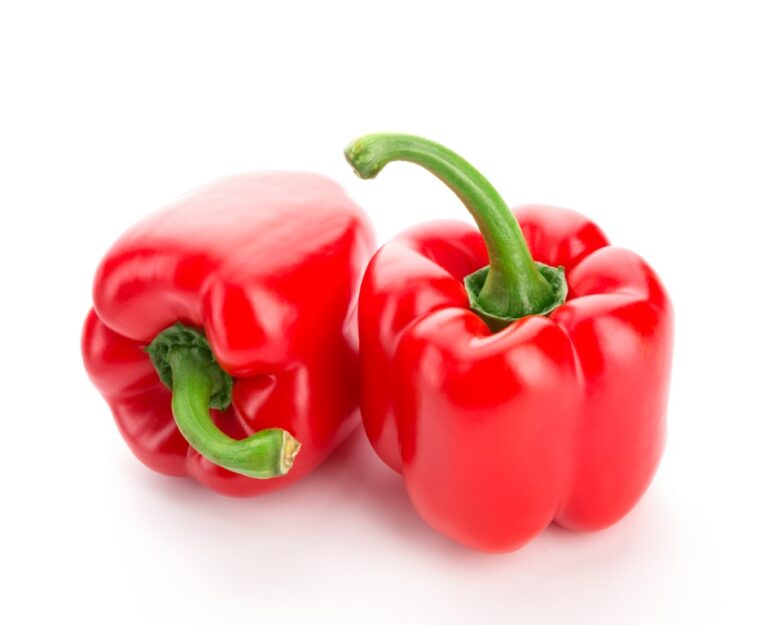 Glossy red Pepper. Isolated over white background. Fresh vegetables.
